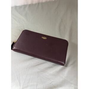UGG Plum colored leather zip around wallet